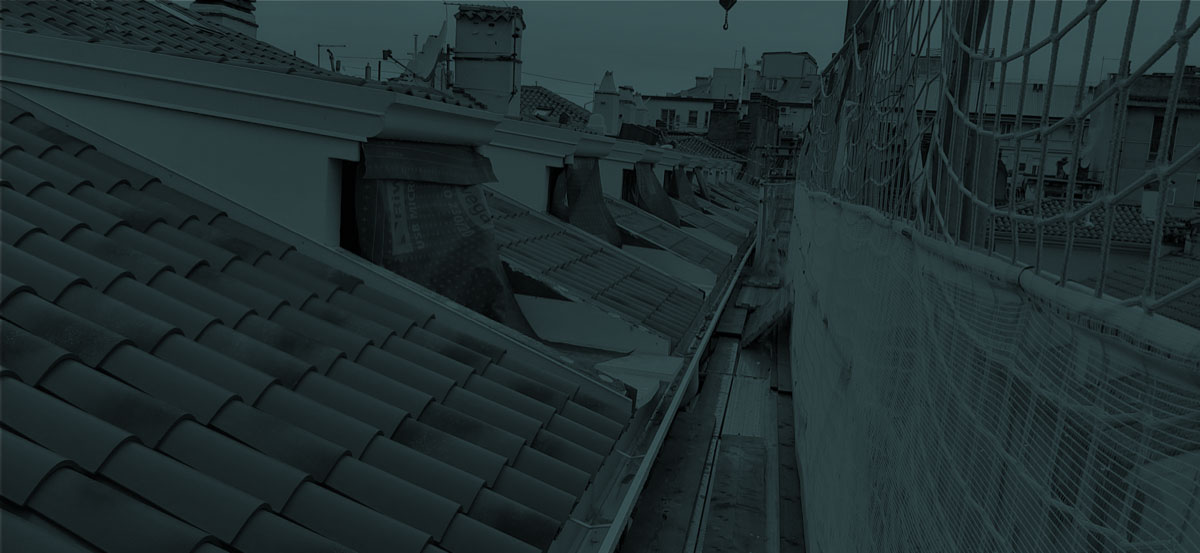 Dettaglio abbaini e nuova copertura edificio storico